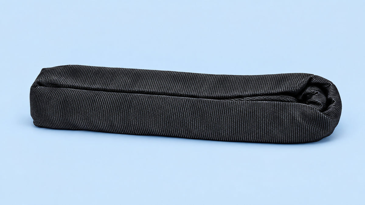 Round sling with polyester rope insert
